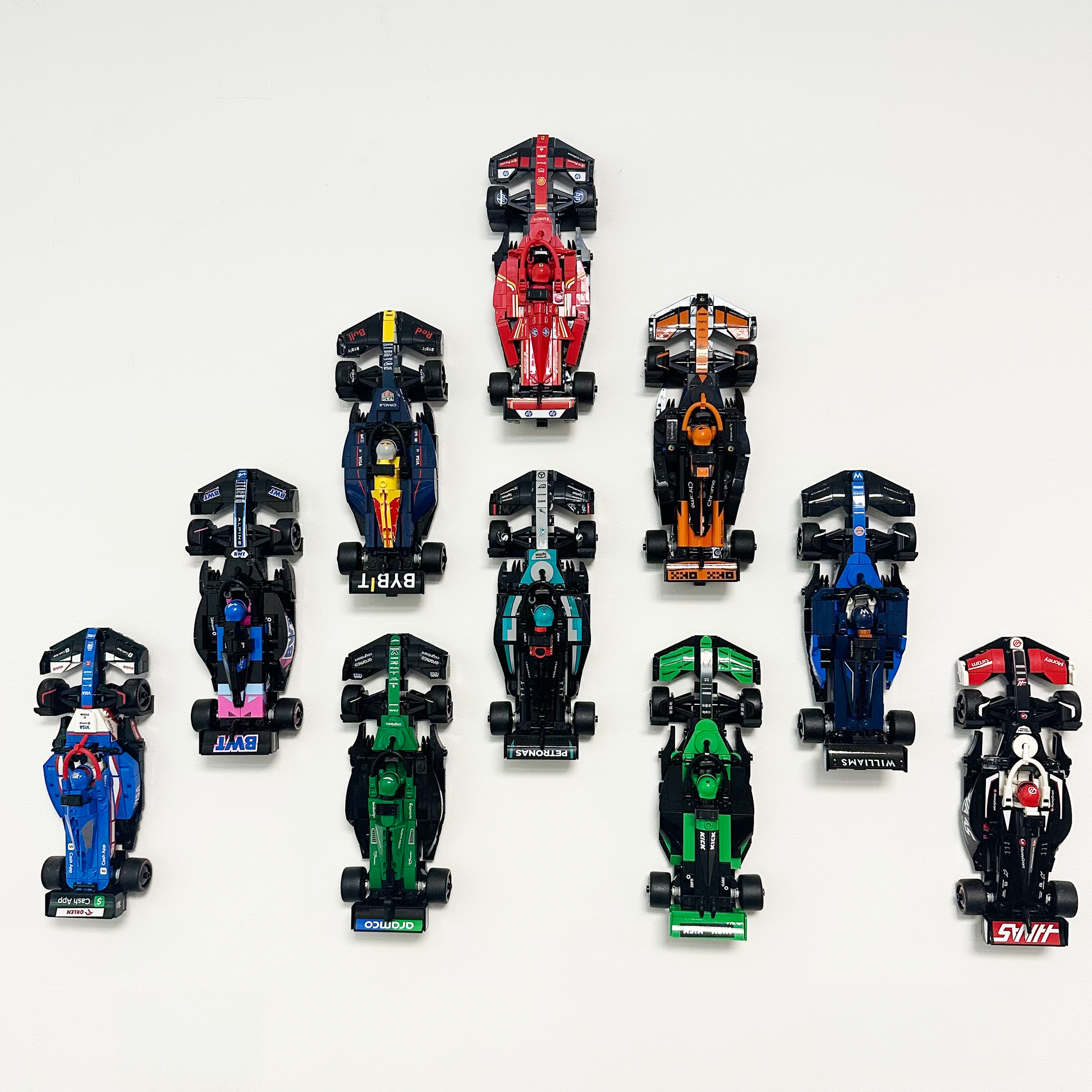 LEGO F1 Speed Champions cars on custom wall display mounts