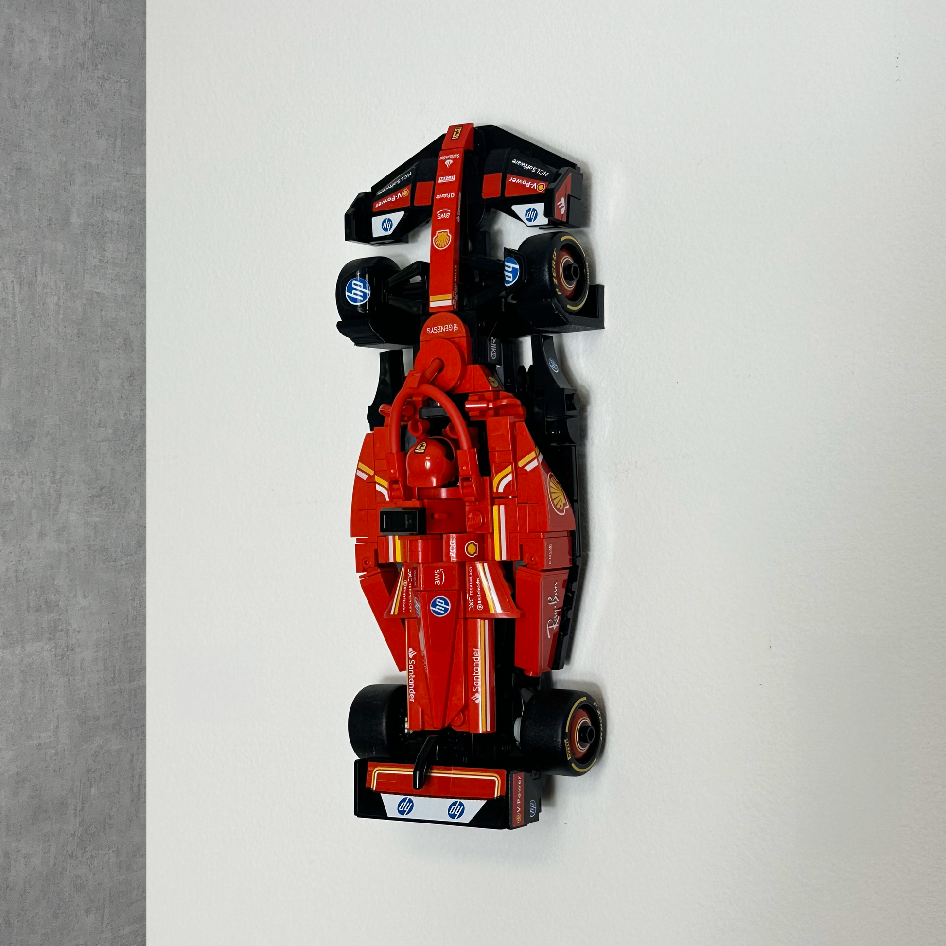 3D-printed custom LEGO wall mounts showcasing Speed Champions race car