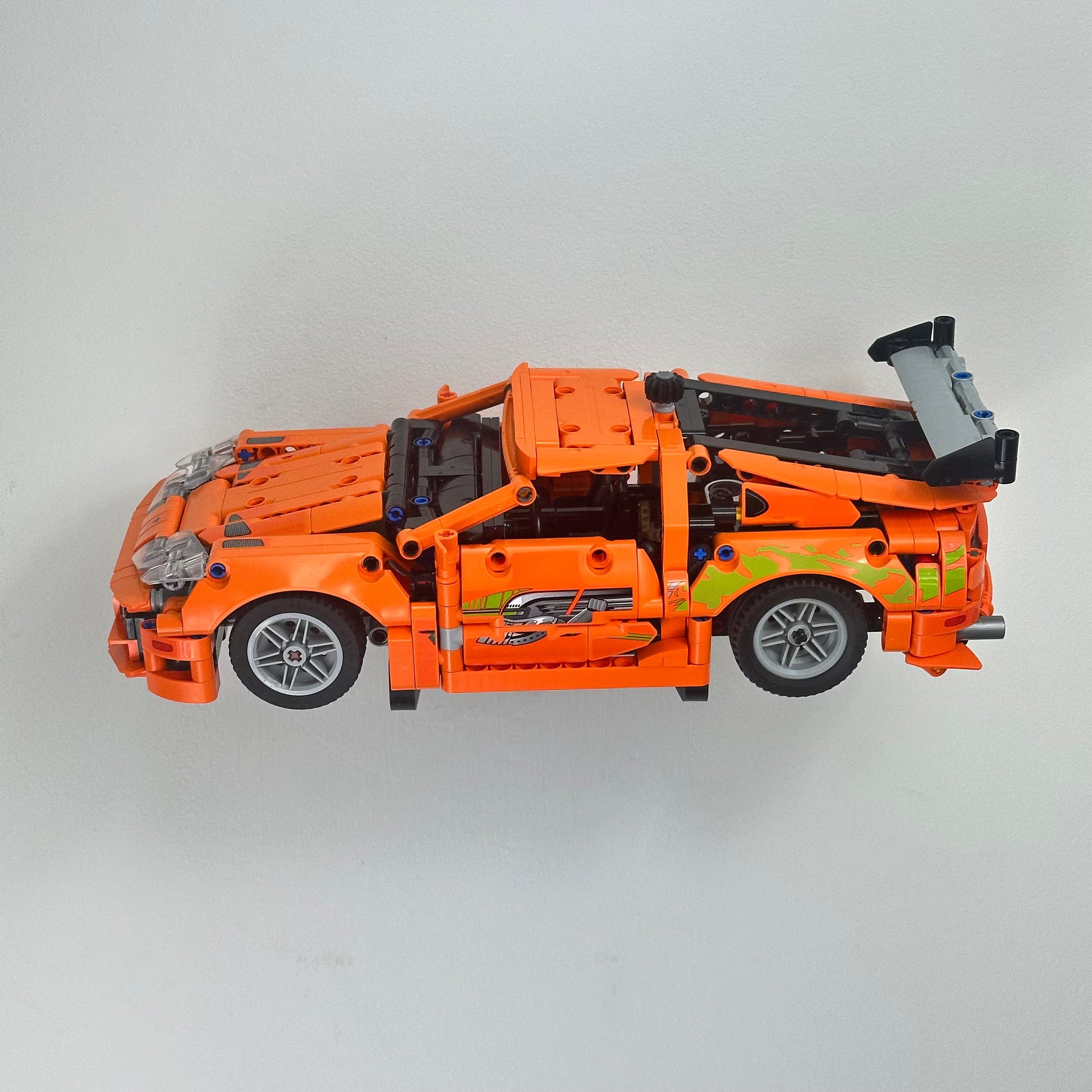 LEGO 42204 Toyota Supra MK4 secured on angled floating wall mount