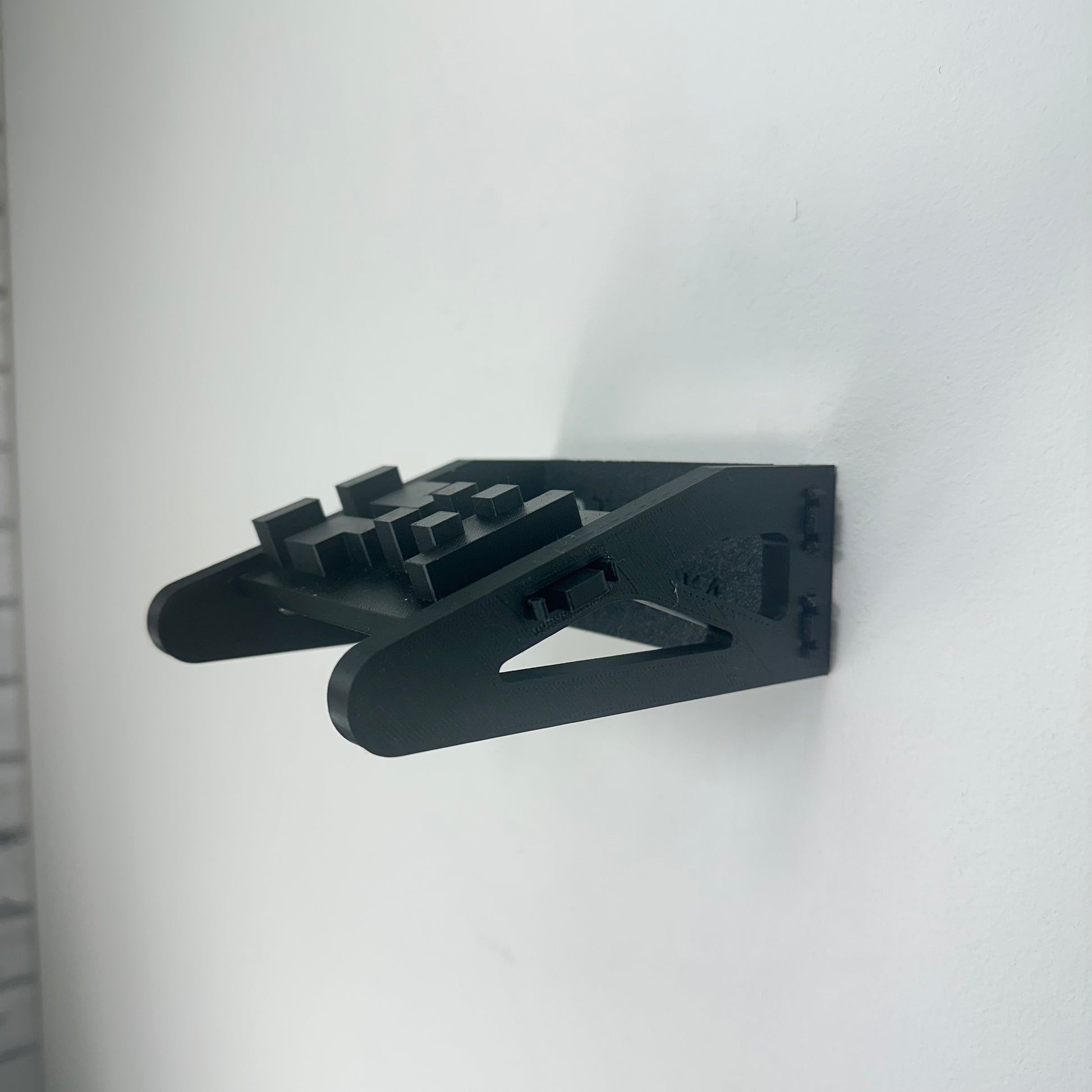 Angled wall mount showcasing LEGO Toyota Supra MK4 42204 model in floating position