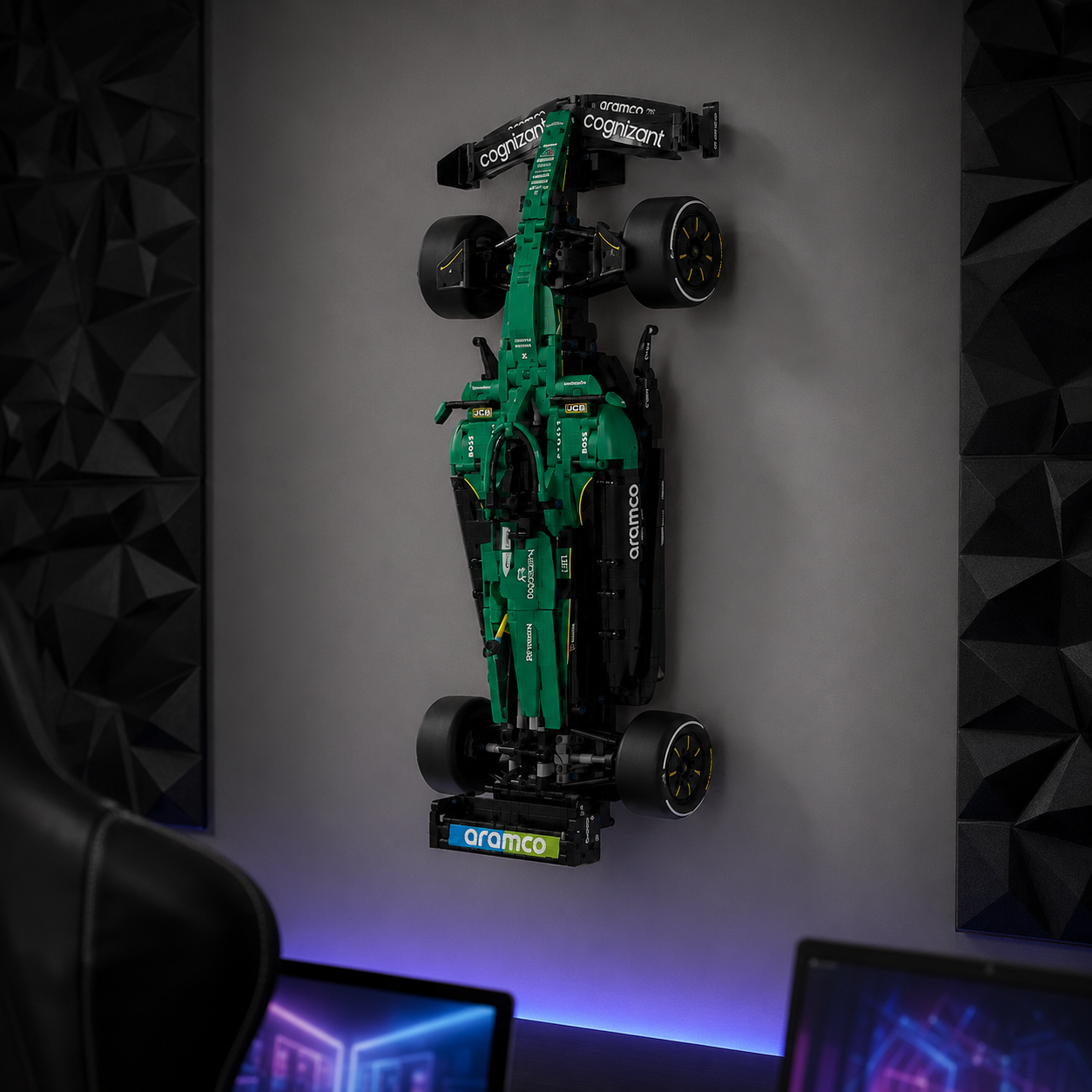 LEGO Aston Martin AMR25 F1 car displayed vertically on a gaming-room wall
