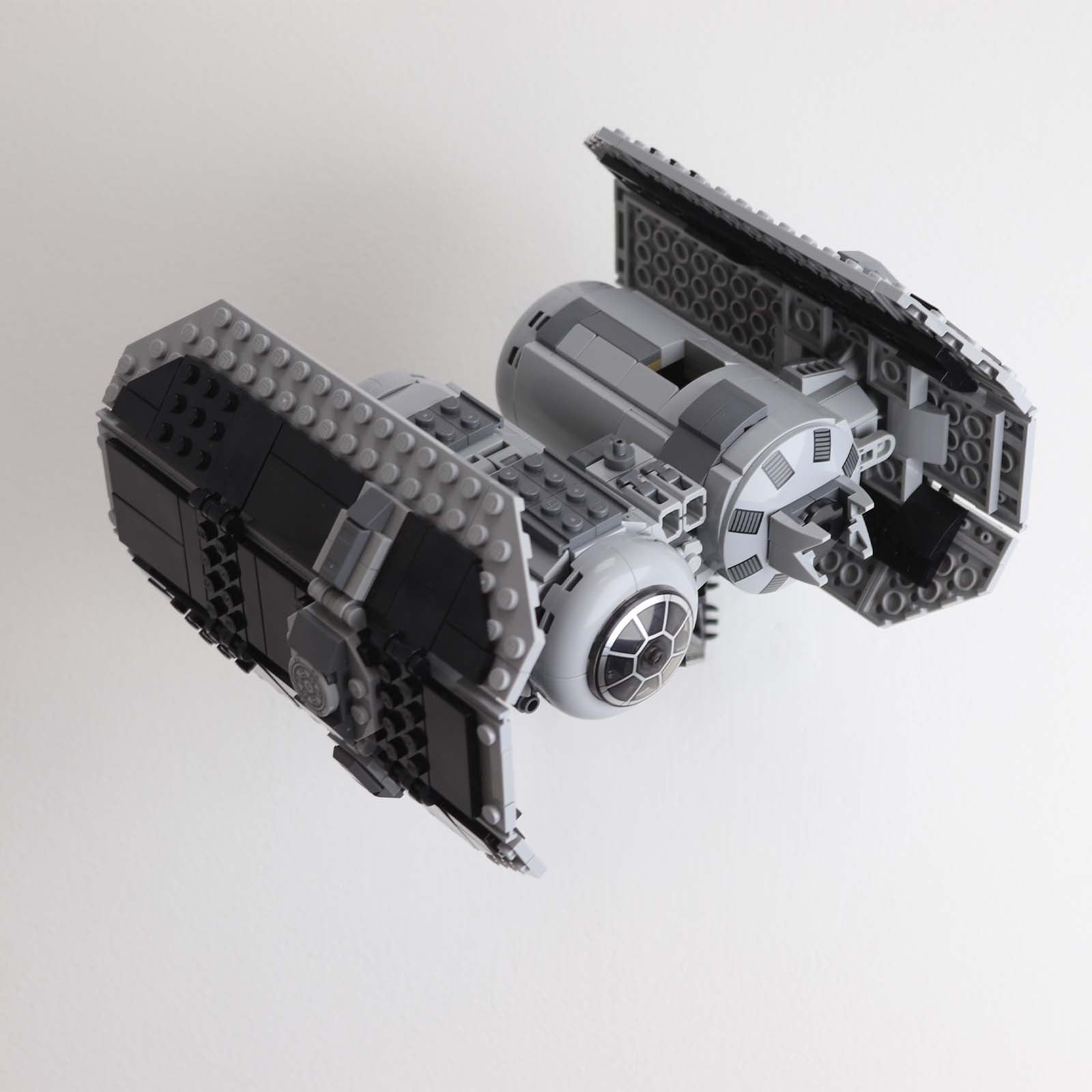 Wall mount display stand for lego tie bomber angled off wall home storage 75347