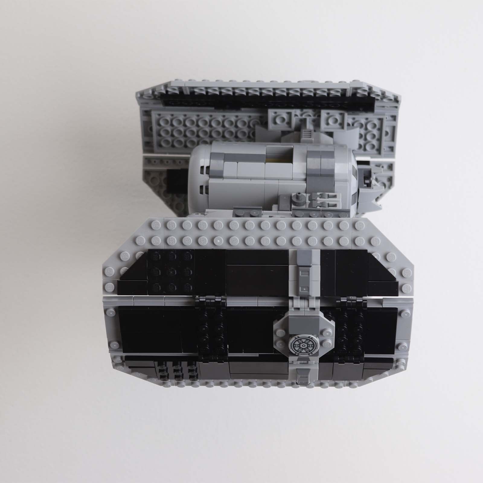 Wall mount display stand for lego tie bomber angled off wall home storage 75347