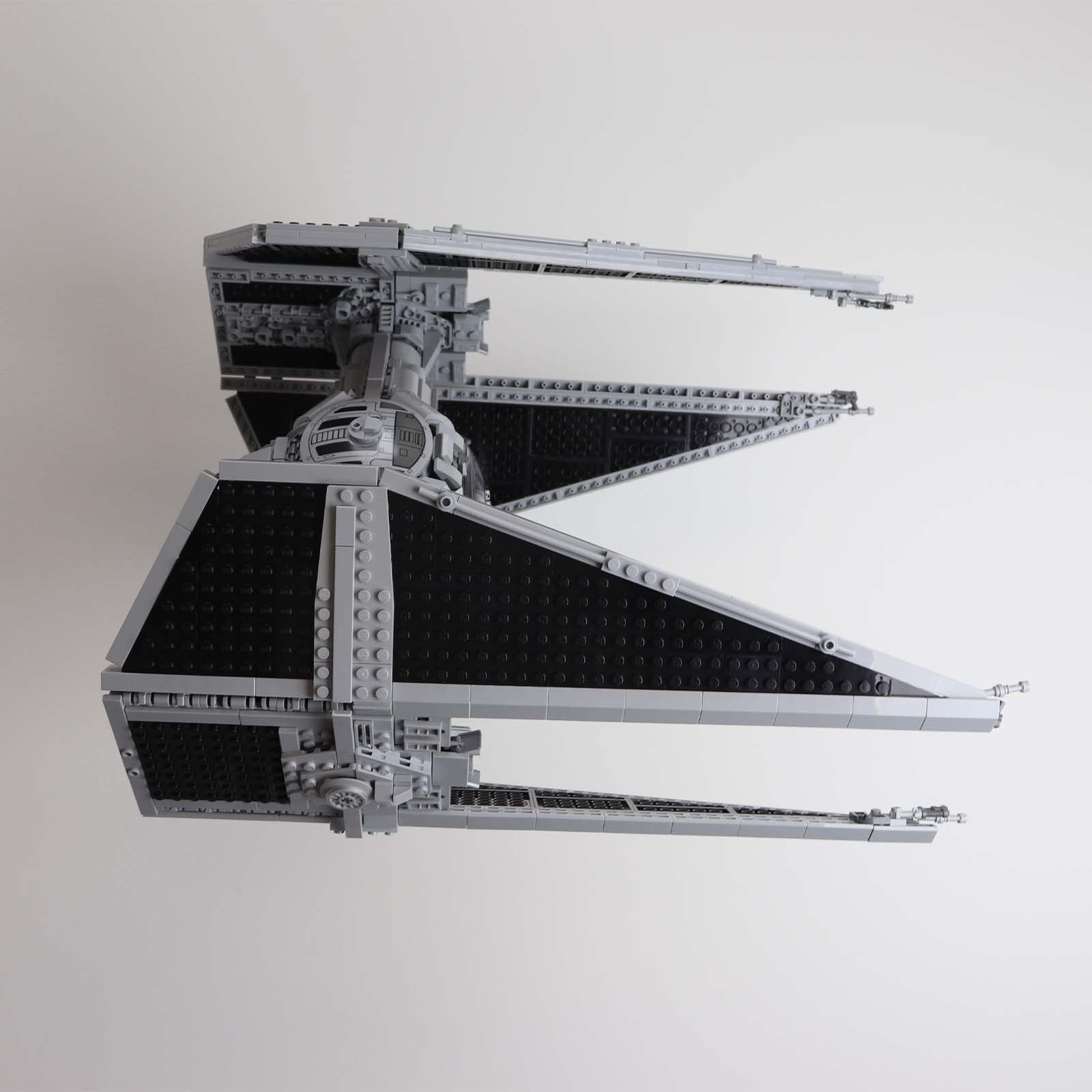 Wall mount display stand for lego Tie interceptor Star Wars angled off wall home storage