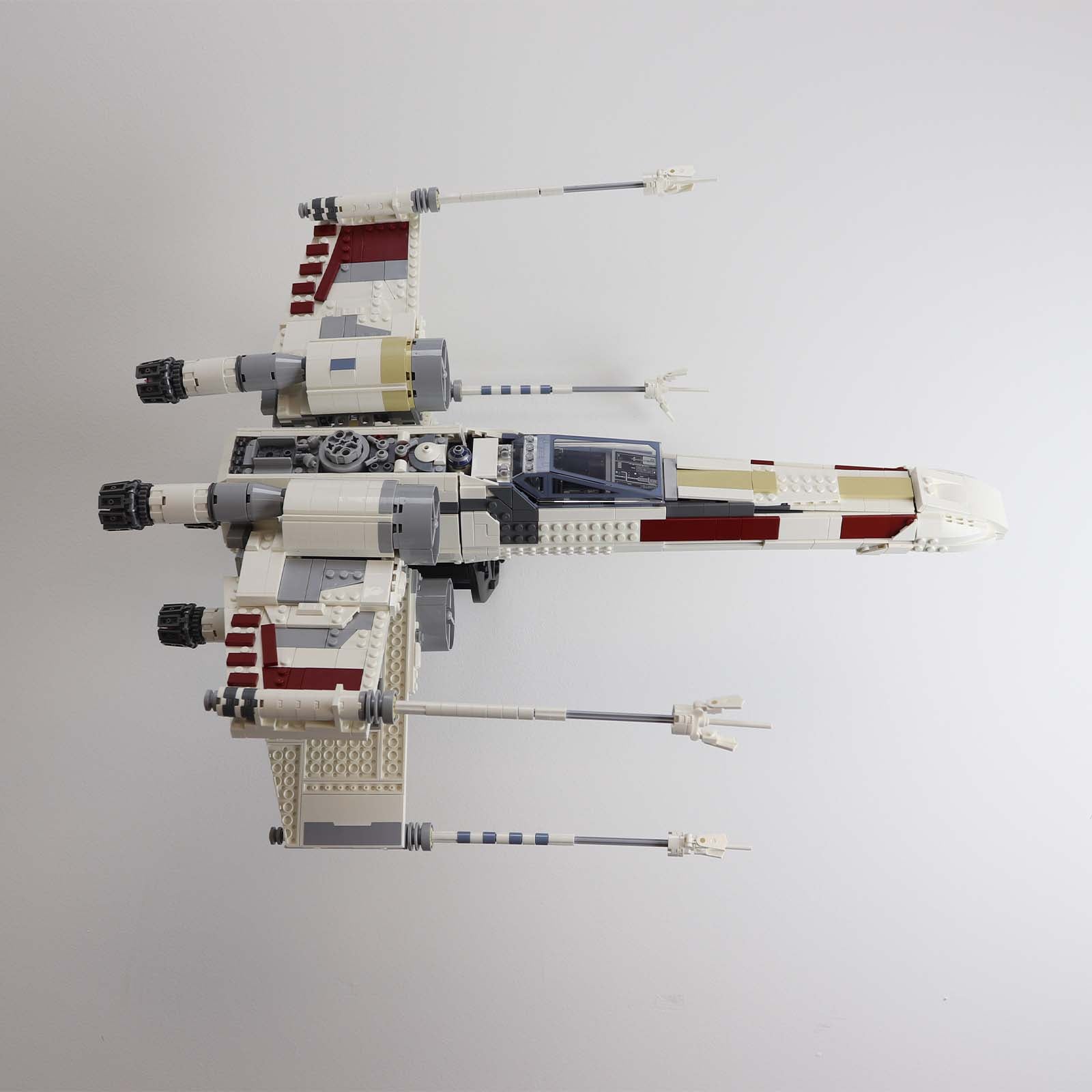 Wall mount display stand for lego UCS x-wing x wing Star Wars angled off wall home storage