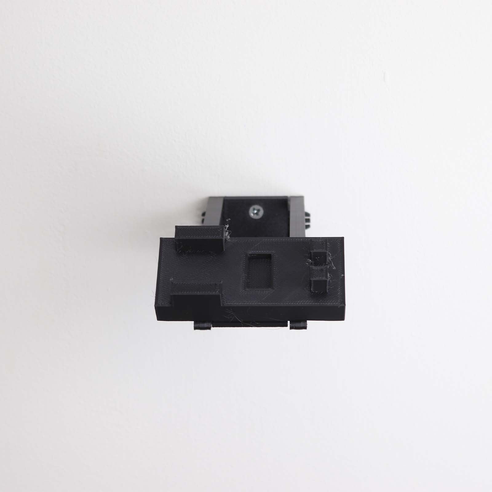 Wall mount display stand holding LEGO® Lamborghini Huracán models 42161 and 42196, presenting the cars at an angled position on the wall for a striking display.