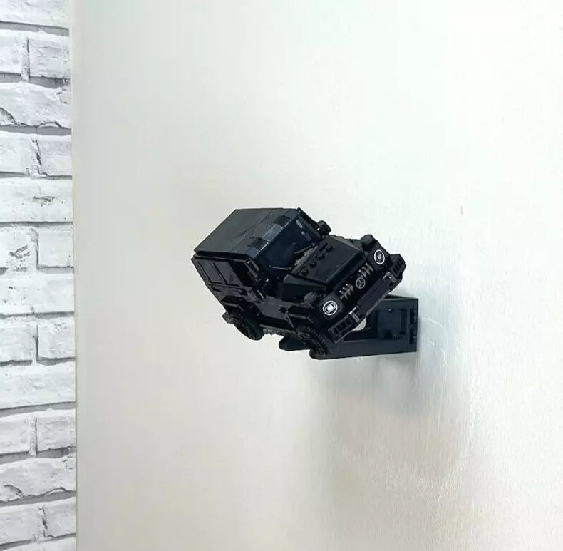 Wall mount display stand holding LEGO® Mercedes-AMG Speed Champion (76924) model, displaying the car at an angled position on the wall for a striking visual presentation.
