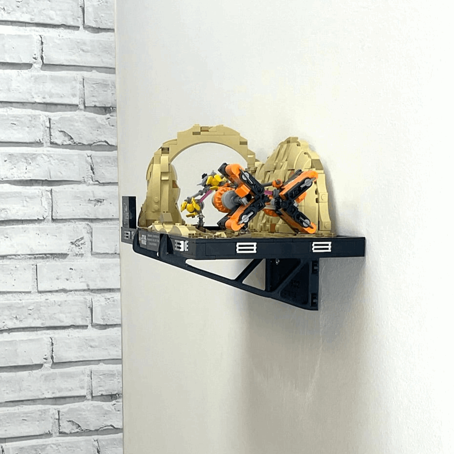 Wall mount display stand holding LEGO® Podrace Diorama (75380), showcasing the intricate scene at an angled position on the wall for an eye-catching display.
