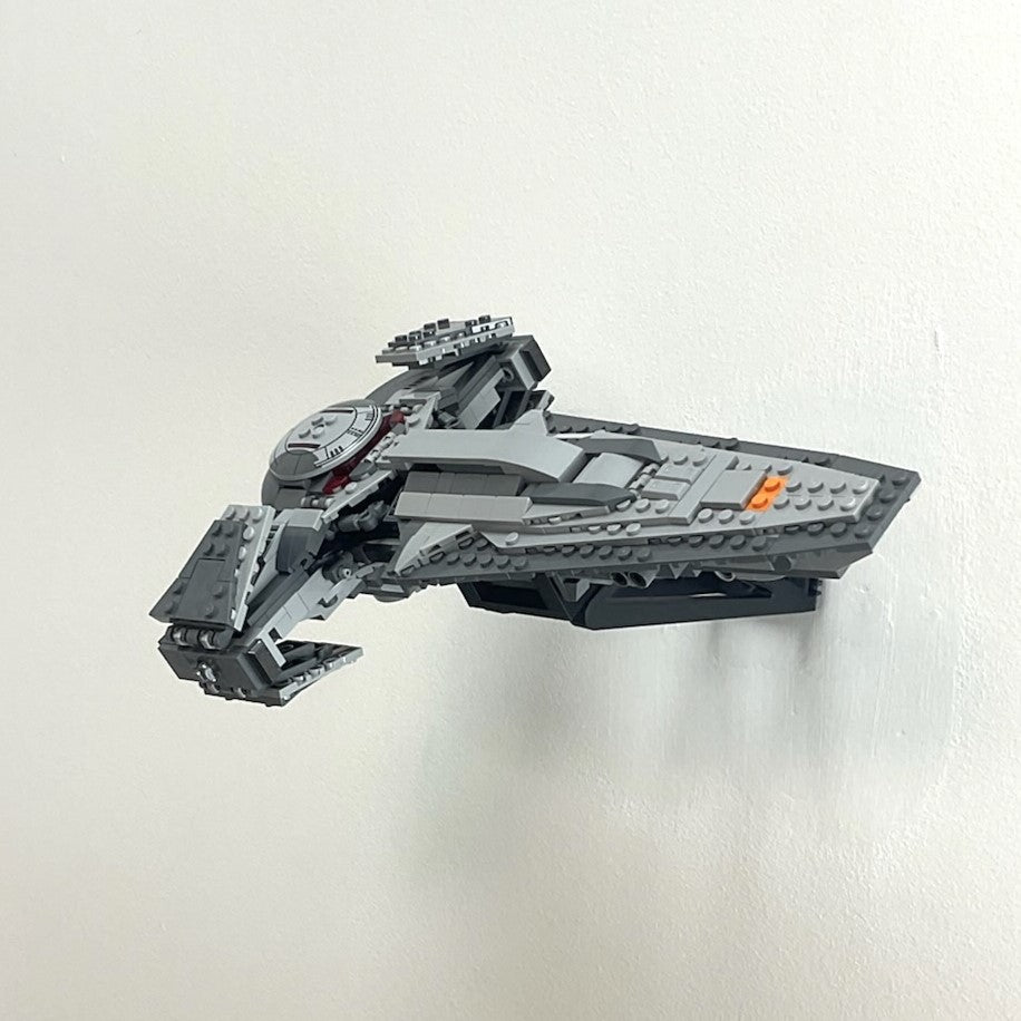 Wall mount display stand holding LEGO® Sith Infiltrator (75383) model, showcasing the starship at an angled position on the wall for an impressive display.
