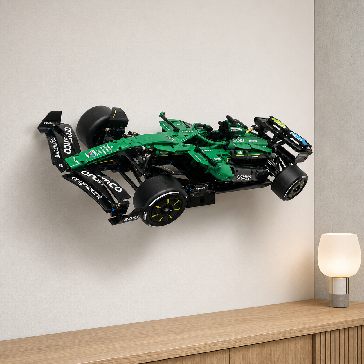 Completed LEGO Technic Aston Martin Aramco AMR25 F1 Car displayed as automotive wall art using an angled black wall mount
