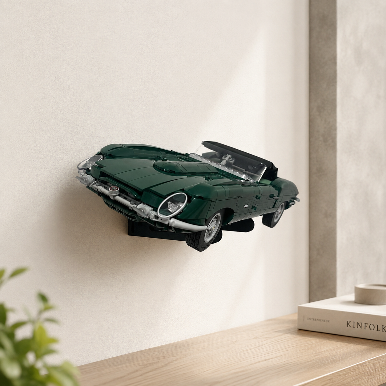 LEGO Jaguar E-Type 11381 displayed at an angle on a wall