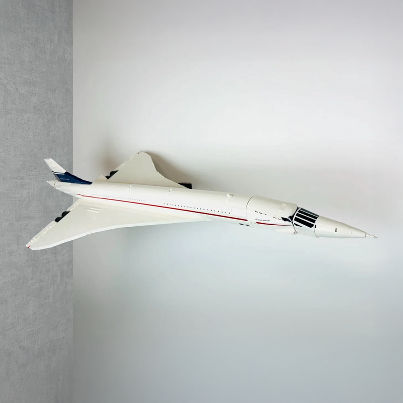 LEGO Icons Concorde 10318 displayed on an angled BrickNest wall mount