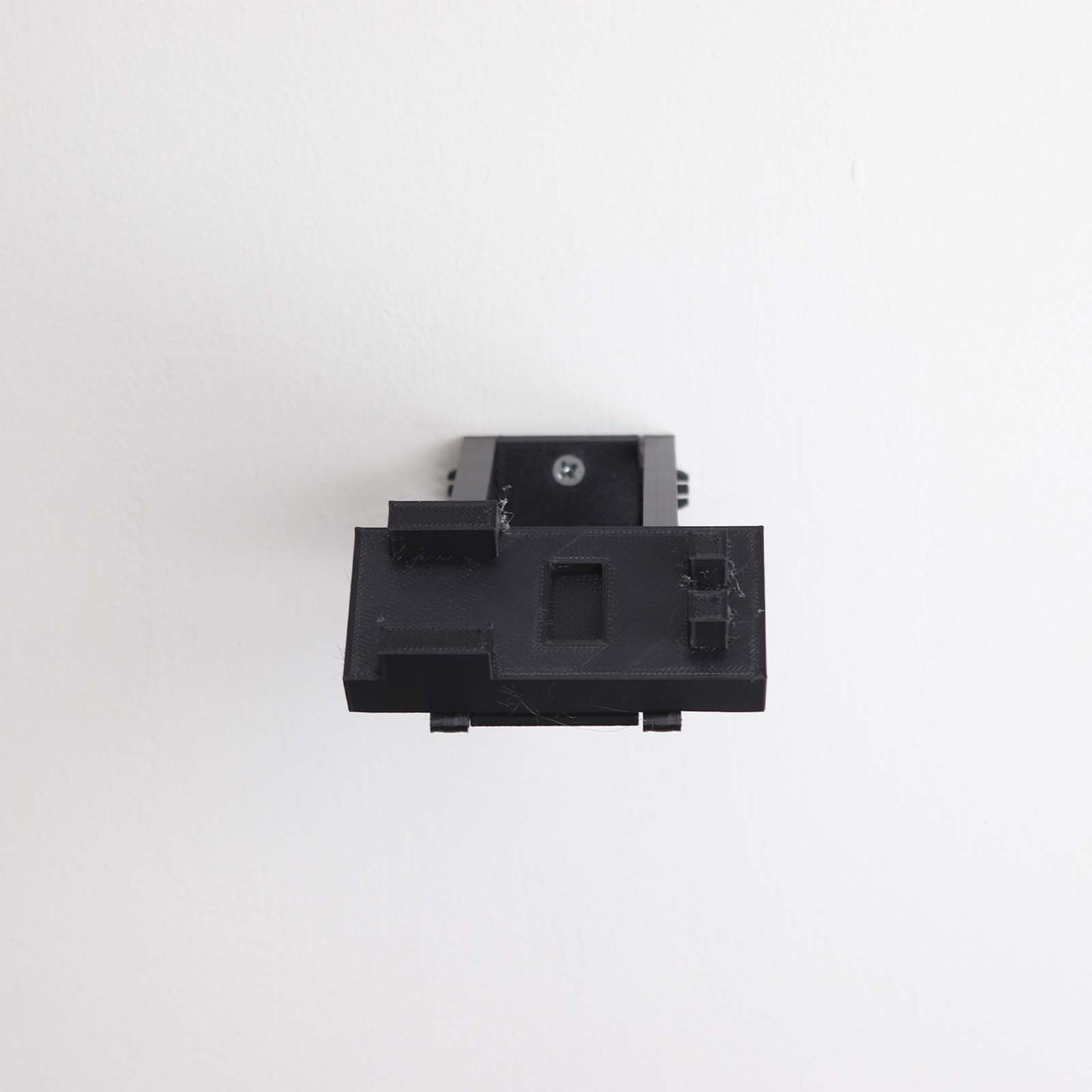 Wall mount display stand holding LEGO® Lamborghini Huracán models 42161 and 42196, presenting the cars at an angled position on the wall for a striking display.
