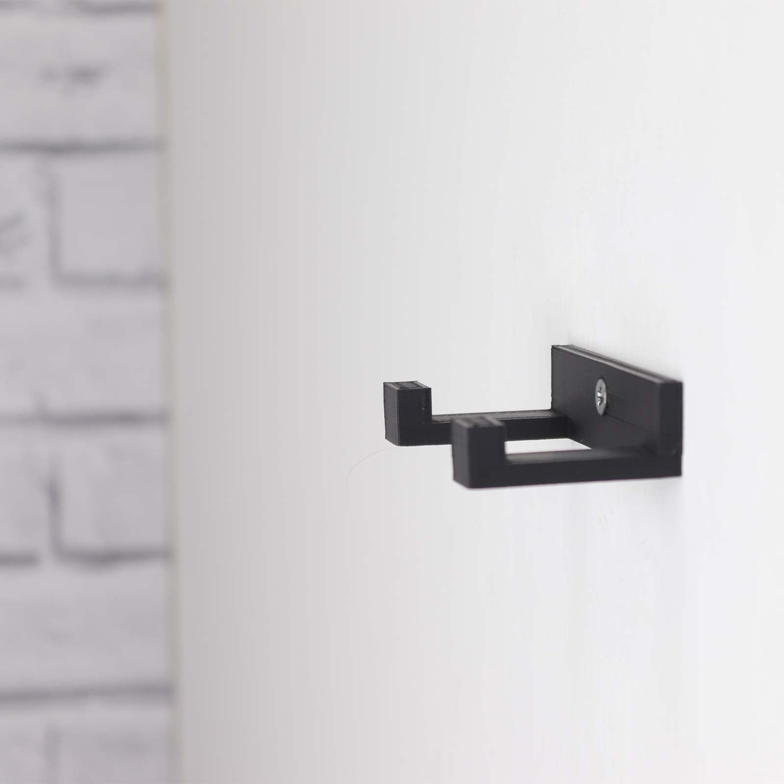 Vertical wall mount display stand holding LEGO® Lamborghini Huracán models 42161 and 42196, presenting the cars at an angled position on the wall for optimal display.

