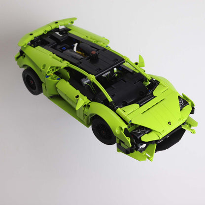 Wall mount display stand holding LEGO® Lamborghini Huracán models 42161 and 42196, presenting the cars at an angled position on the wall for a striking display.
