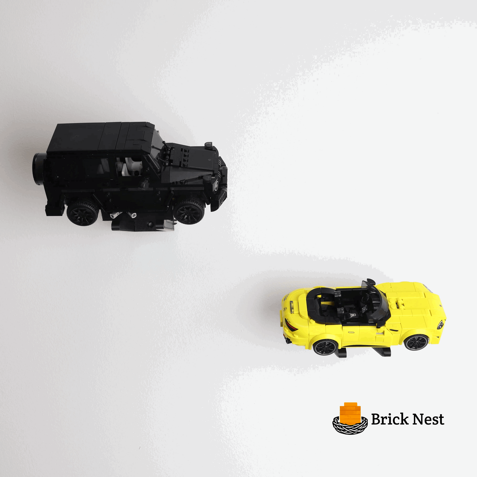 Wall mount display stand holding LEGO® Mercedes-AMG Speed Champion (76924) model, displaying the car at an angled position on the wall for a striking visual presentation.
