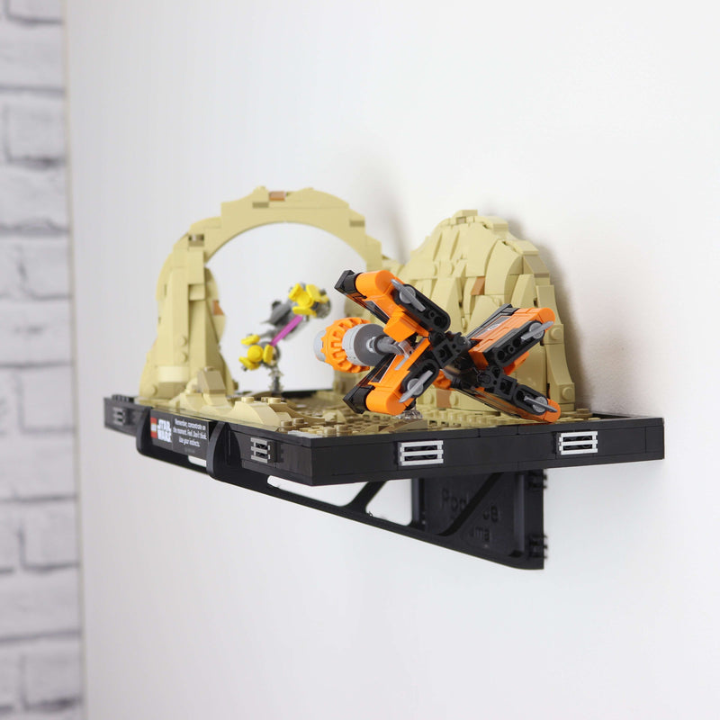 Wall mount display stand holding LEGO® Podrace Diorama (75380), showcasing the intricate scene at an angled position on the wall for an eye-catching display.
